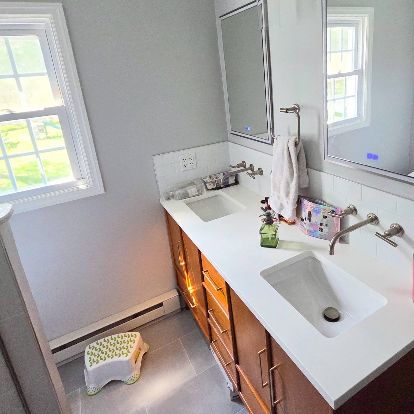 Wood double vanity with wall-mounted faucets